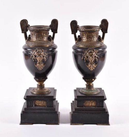 a pair of french empire black marble urns with bronze mounts