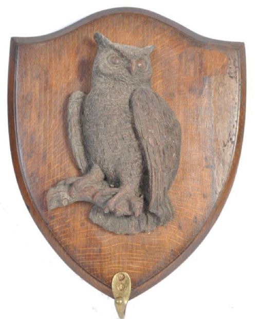 c19th owl on a shield back with hanging hook