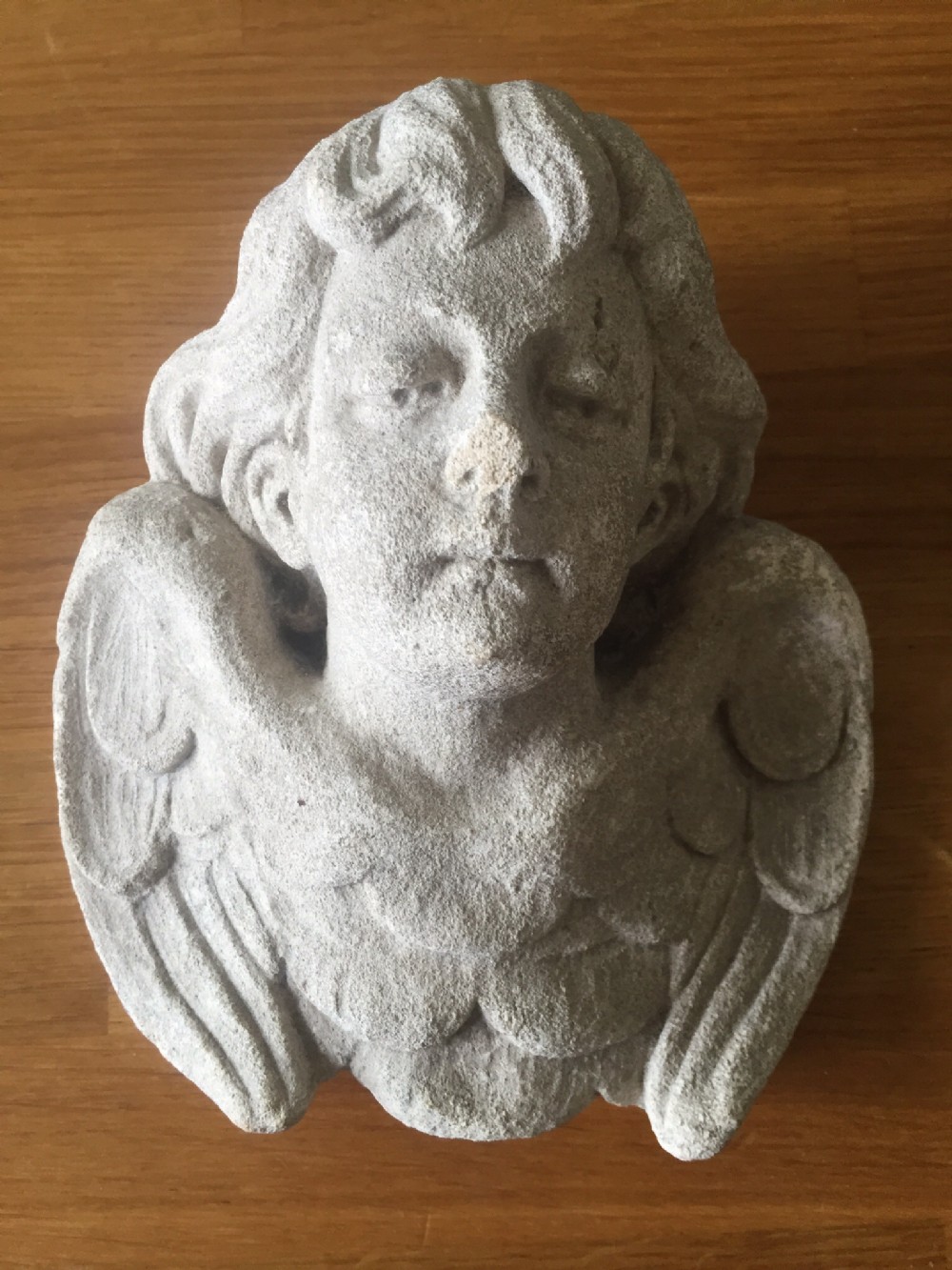 c19th carved limestone cherub