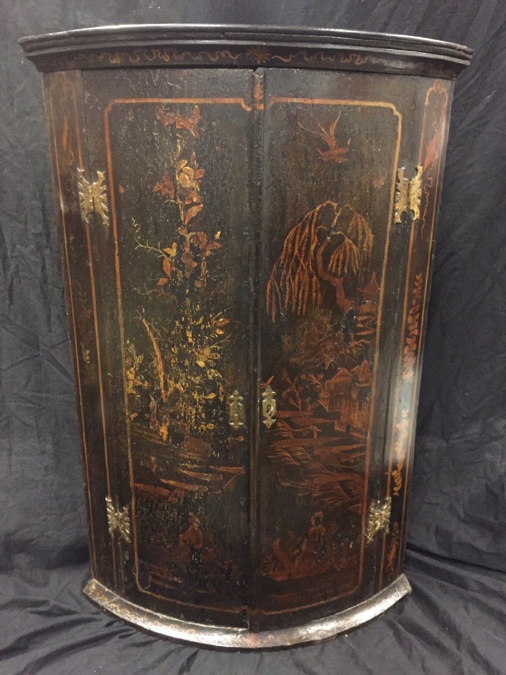 c18th bow fronted lacquered chinoiserie corner cupboard