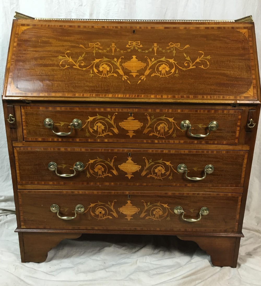 inlaid bureau with brass gallery