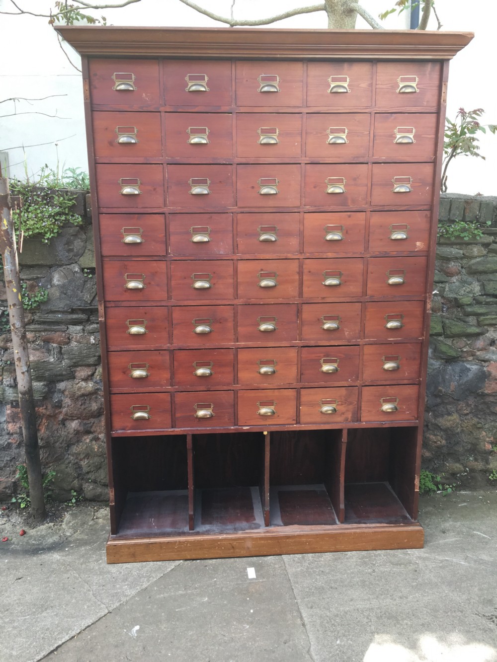a large c19th bank of 40 pine drawers