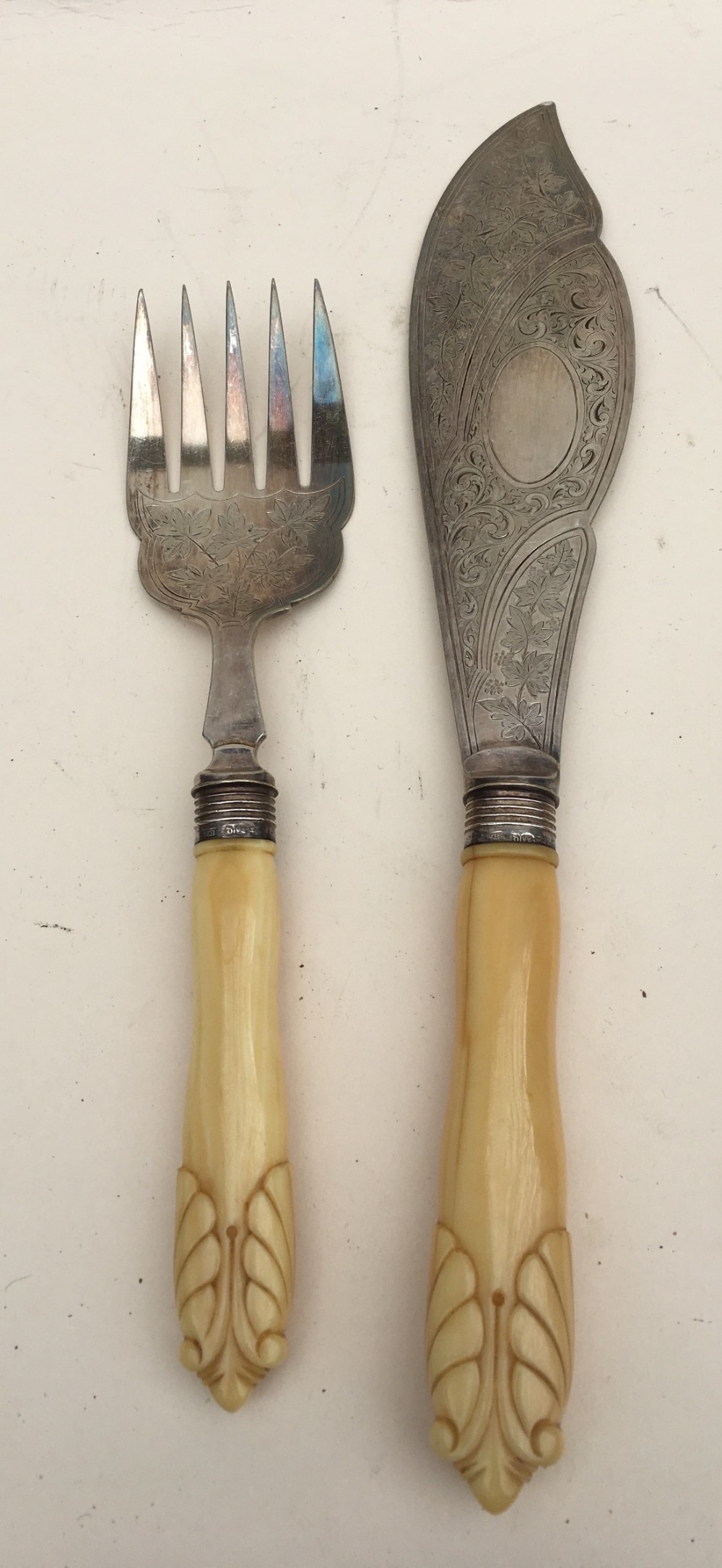 pair of fish servers hm silver dollars and ivory handles