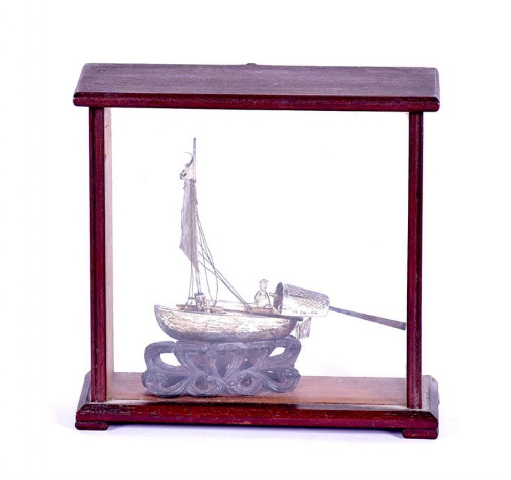 small chinese white metal model of a chinese junk