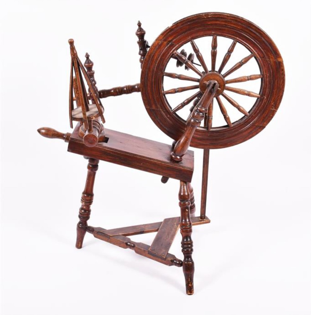 an early c19th oak spinning wheel