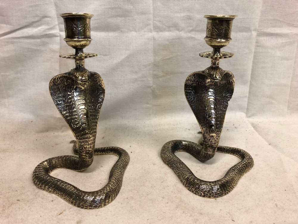 c19th pair of brass candlesticks shaped as cobras
