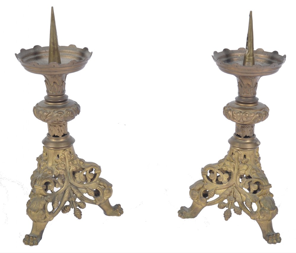a pair of cast brass altar pricket sticks