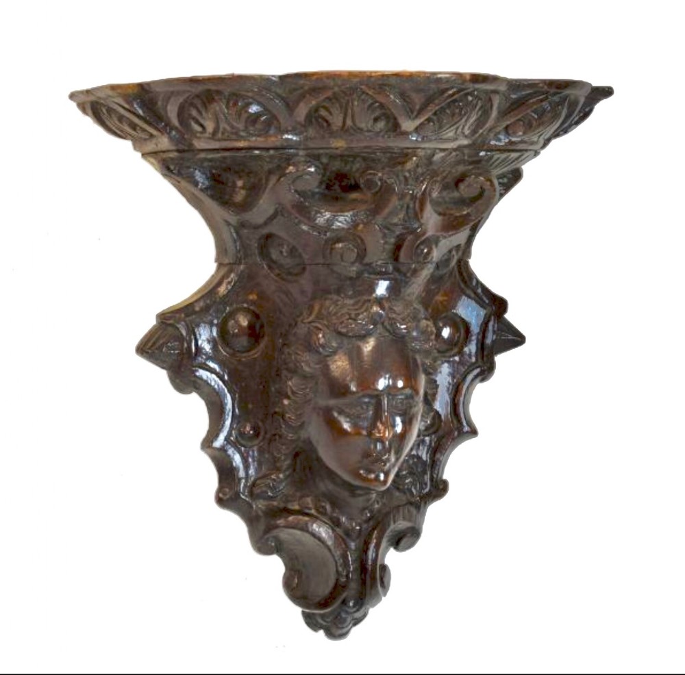c17th carved figurative wall bracket
