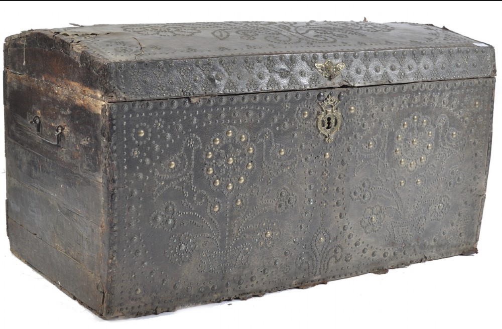 early c18th leather studded domed top trunk
