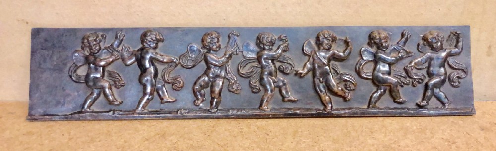c18th cast bronze plaque of bacchalian cherubs