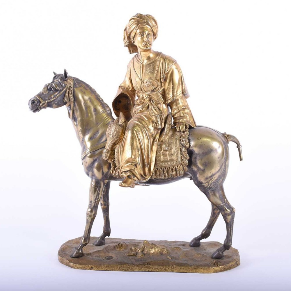 gilt bronze figure of an arabian on a horse