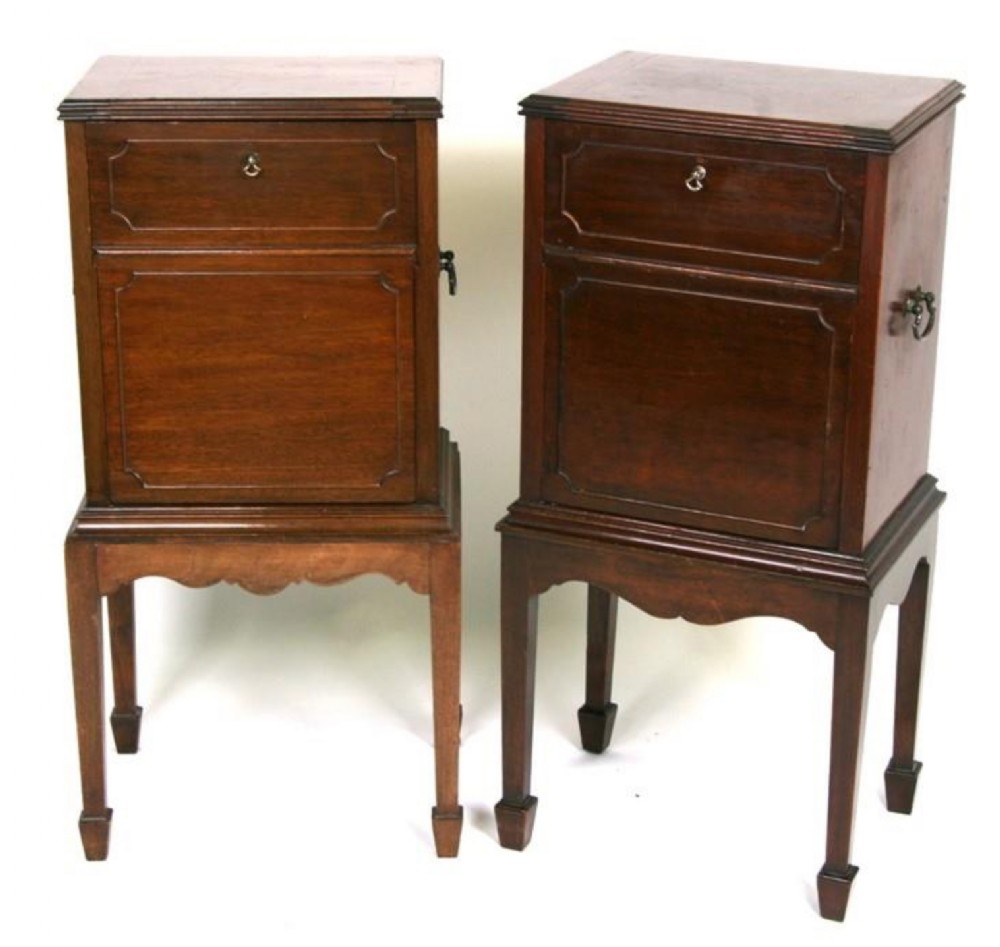a pair of edwardian mahogany bedside cabinets