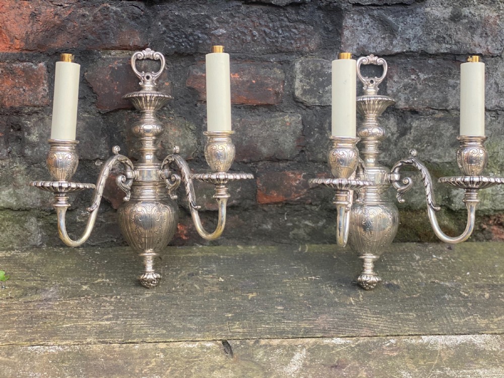 pair of edwardian silver plated twin armed wall lights