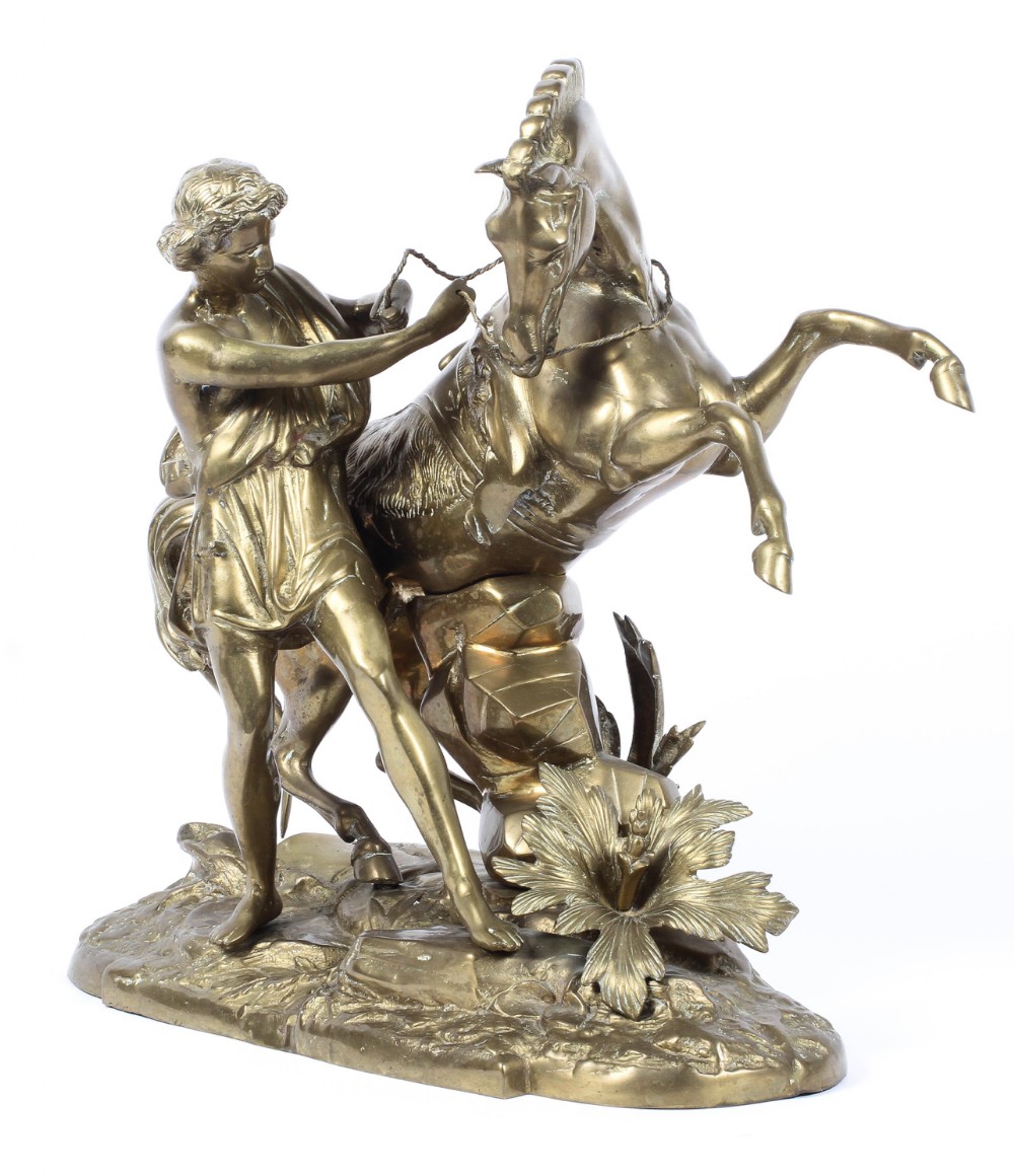 large gilt metal sculpture of a marley horse