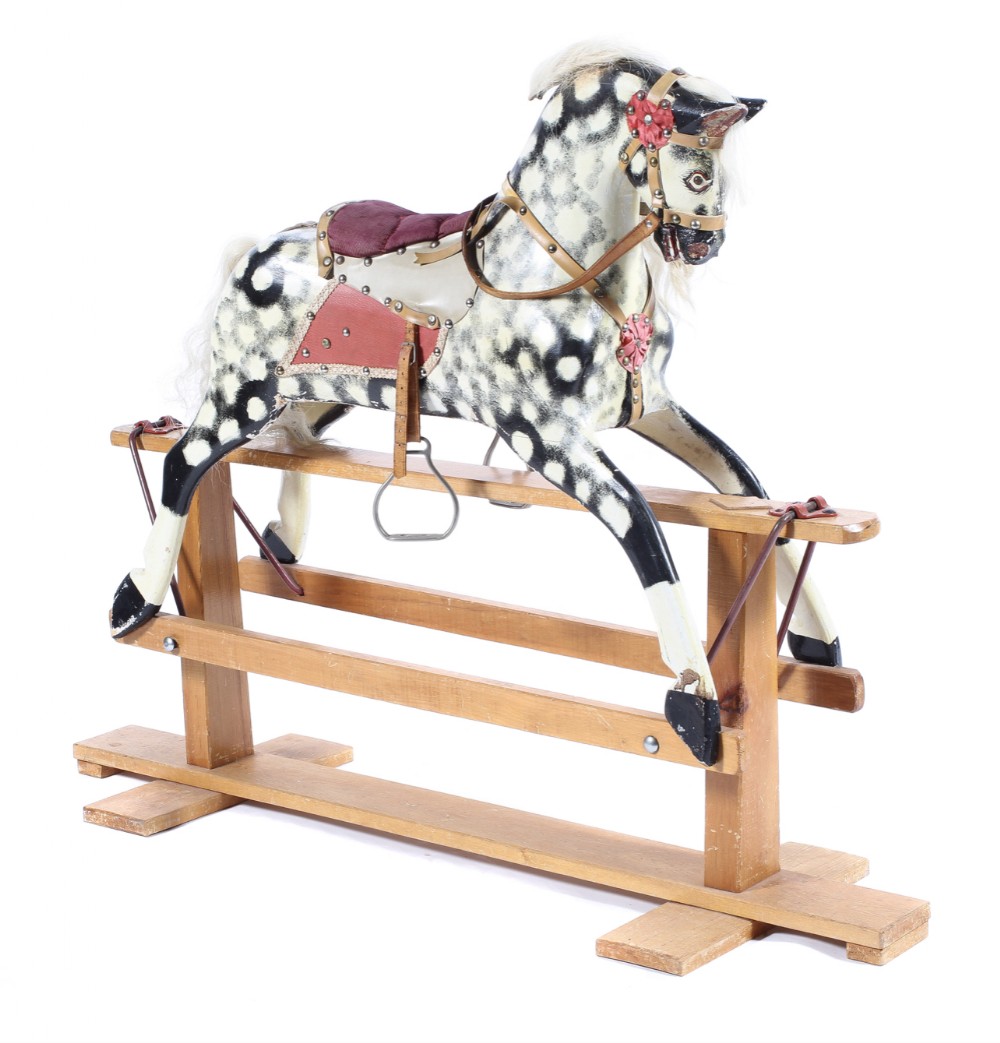 a medium size collinson dapple grey rocking horse