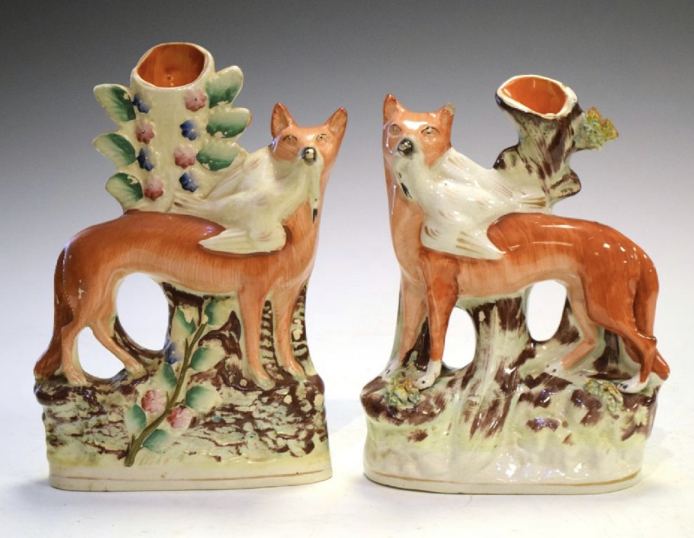 c1860 staffordshire pair of flat back figures of foxes with a bird