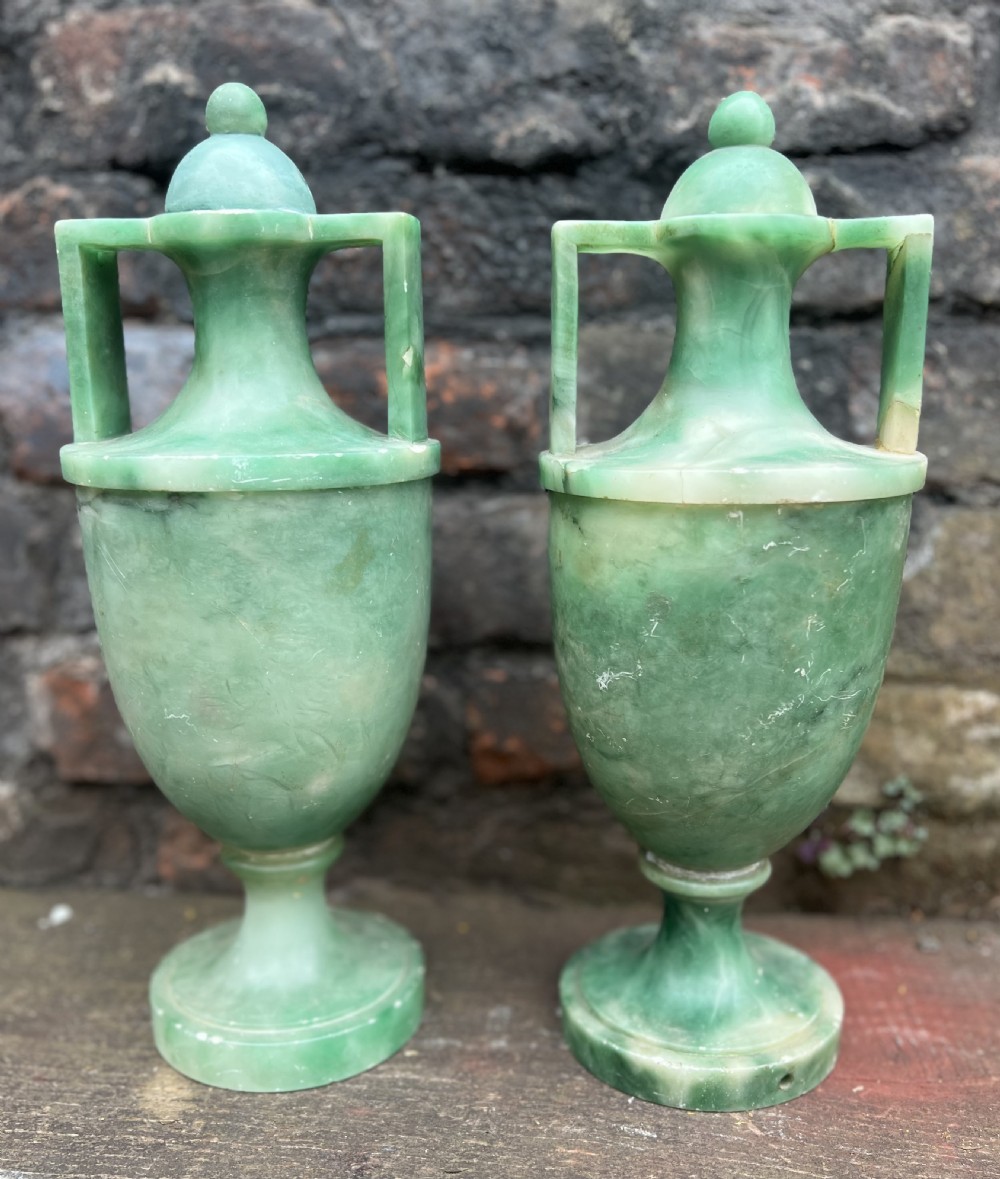 a pair of jade green classical alabaster urns