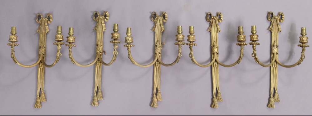 set of five classical style ribbon and swag wall lights