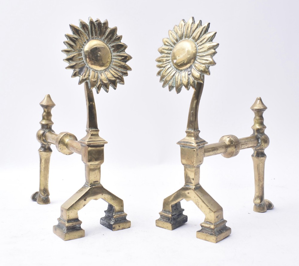 a pair of c19th brass fire dogs in the manner of thomas jekyll