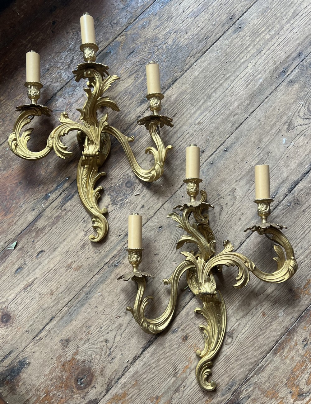 pair of three branch rococo wall lights