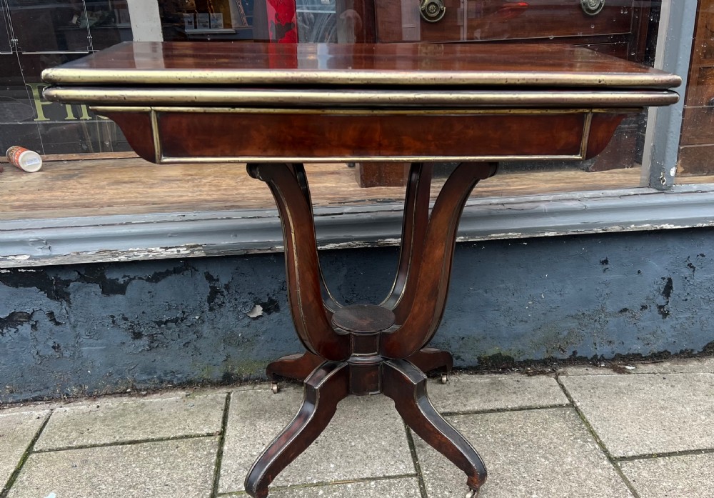 mahogany and brass decorated card table