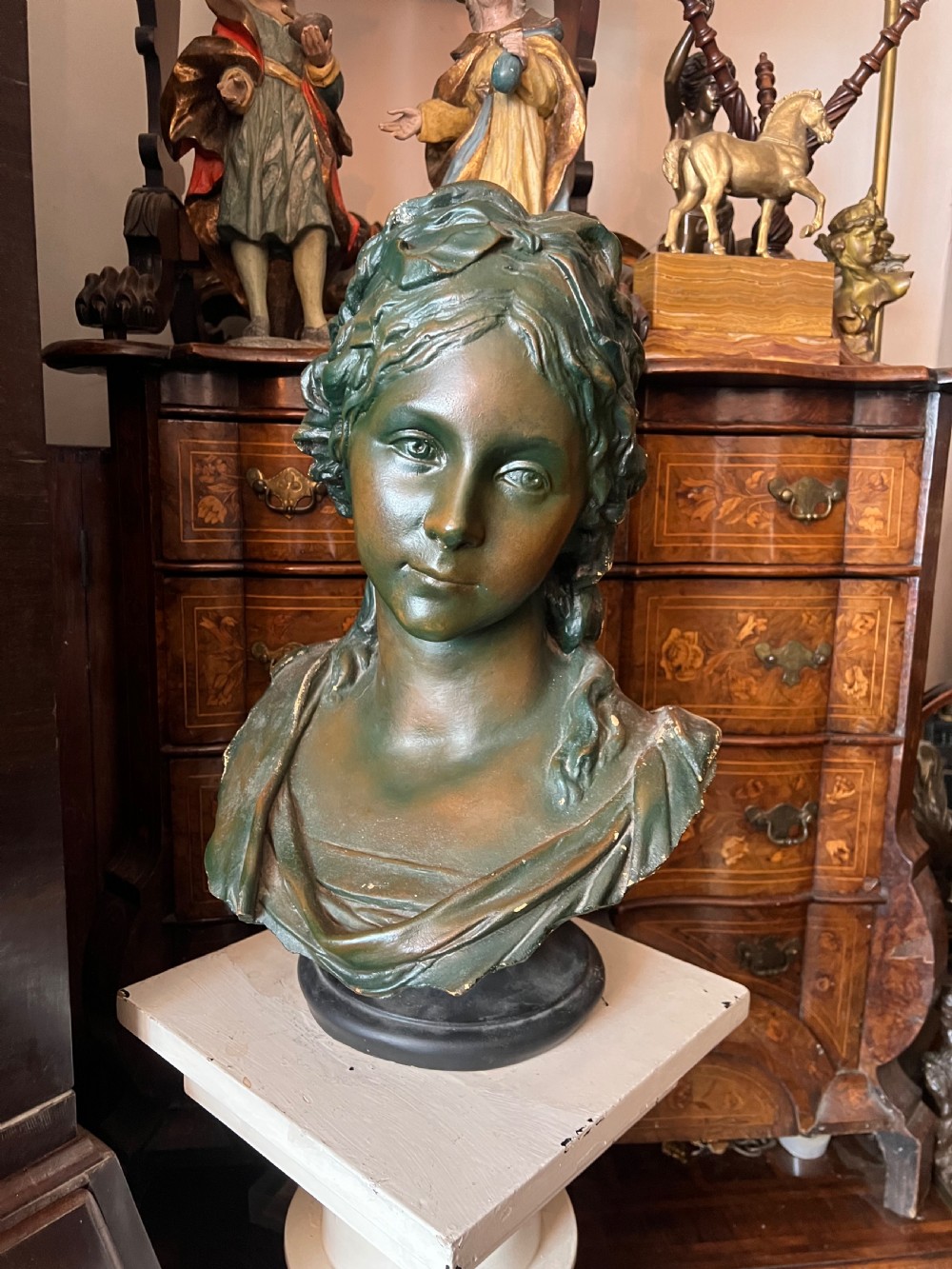 bronzed terracotta bust of a classical woman
