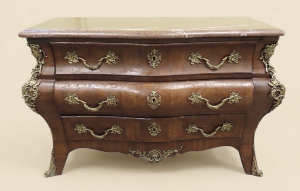 large french bombe shaped walnut and kingwood commode