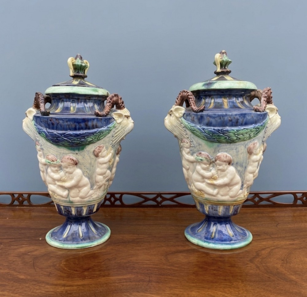 pair of majolica urns and covers